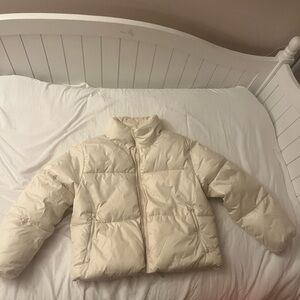A medium cream cropped puffer jacket from Old Navy